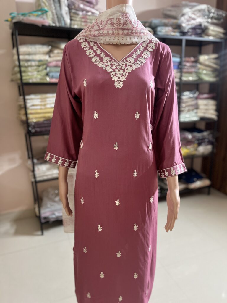 Step into elegance with this beautiful sunshine yellow kurti set, crafted from soft, breathable cotton for all-day comfort. Adorned with delicate white embroidery on the yoke and scattered floral motifs, the set includes a matching pant and a soft cotton dupatta with subtle prints, adding a graceful charm to your look.