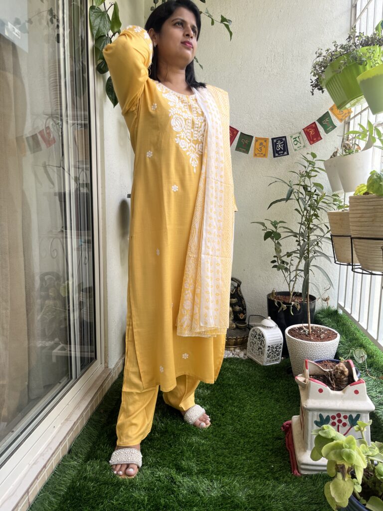 Sunshine Yellow Cotton Kurti Set Step into elegance with this beautiful sunshine yellow kurti set, crafted from soft, breathable cotton for all-day comfort. Adorned with delicate white embroidery on the yoke and scattered floral motifs, the set includes a matching pant and a soft cotton dupatta with subtle prints, adding a graceful charm to your look.